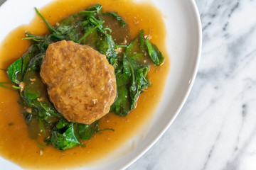Stir fried ivy gourd with minced pork