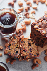 fruit cake white a cup of black coffee