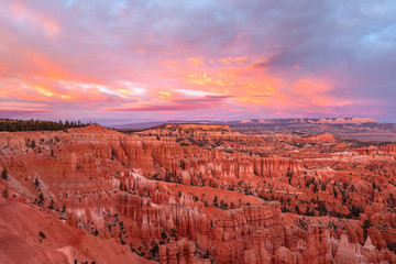 Beautiful orange hoodoos from Sunset Point at sunset in Bryce Canyon National Park in Utah