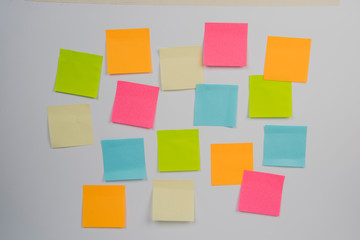 colorful sticky notes on white background