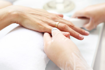 Hand spa, relaxing hand massage. Beautiful female hands