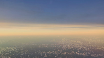 Sunset sky aerial view from airplane.