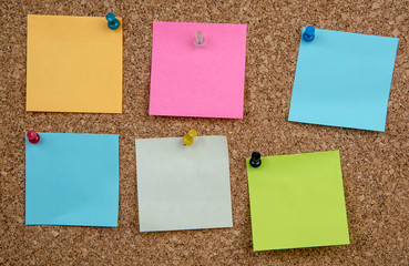 blank notes on cork board