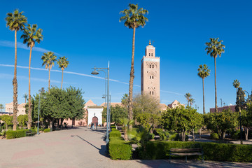 Fototapeta premium Koutoubia Mosque is the largest mosque in Marrakech, Morocco. It is also known by several other names, such as Jami ‘al-Kutubiyya, Koutoubia, Kutubiya, Kutubiyya and the Booksellers’ Mosque. Sunny day