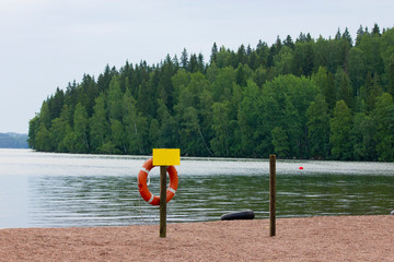 Fototapeta na wymiar no swimming sign on the beach