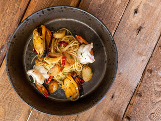 Spaghetti stir fried seafood with spicy sauce