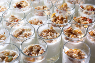 Yogurt in cups sprinkled with nuts