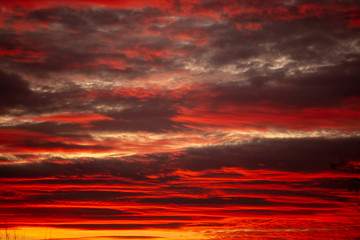 Dramatic deep red sunset clouds 