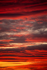 Golden and red sunset with clouds