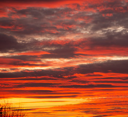 Dramatic sunset with golden and red hues