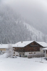 Snowfall in a mountain city in Italy. Trentino region