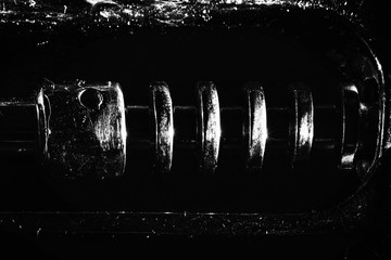 details of a corkscrew on a black background