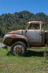 Te Urewera National Park New Zealand. Tropic jungle. Oldtimer truck. Abandoned. Bedford