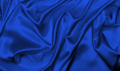 Blue abstract silk fabric background.