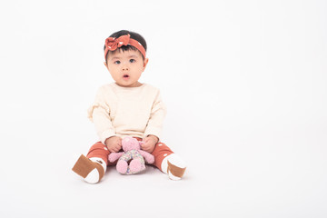 Adorable Asian baby girl is portrait on white background
