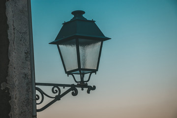 Fototapeta na wymiar Vintage green street lamp in summer