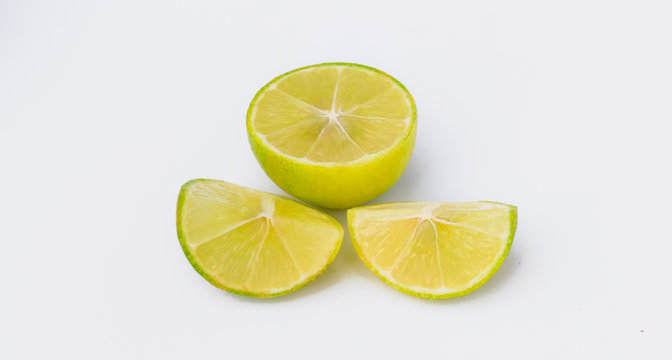 close up of slices of a green lemon