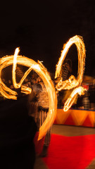 Fire Dancer street performance trail fire red yellow