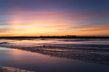Beautiful sunset at Mont saint Michel , Normandy, France.