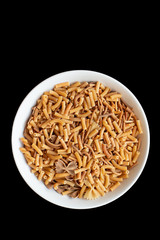 Dried macaroni in a white dish