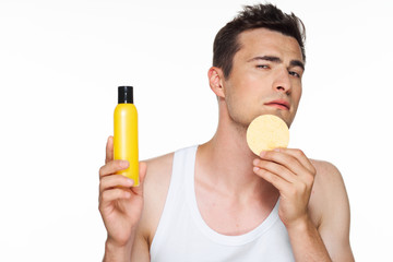 Fototapeta premium man drinking orange juice isolated on white