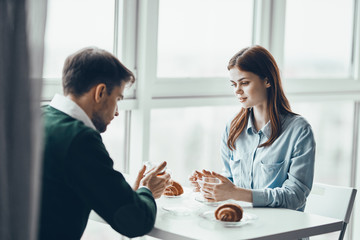 business people shaking hands finishing up meeting
