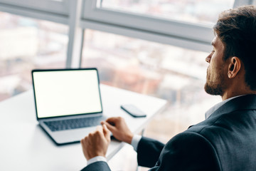 businessman working on tablet computer in office