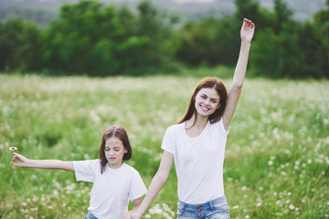 mother and daughter having fun in the park