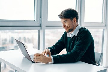 businessman working on laptop in office