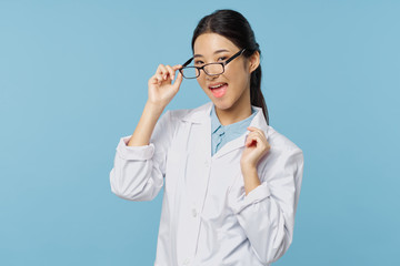 young doctor with stethoscope isolated on white