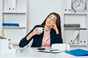 businesswoman talking on phone in office