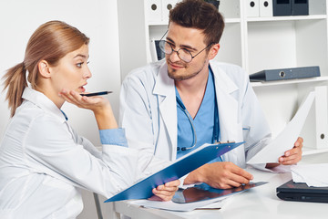 portrait of doctor with patient in hospital