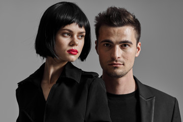 portrait of young man and woman