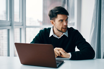businessman working on laptop in office