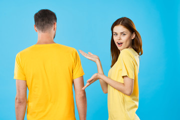 Fototapeta premium young couple in t-shirts chatting