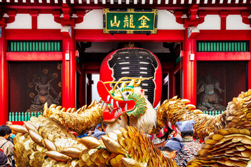 Shinny Golden Dragon dancing on the event of "Kinryu no mai" in the  Asakusa Kaminarimon Ceremony in Tokyo, Japan