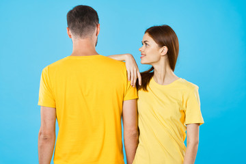 Fototapeta premium young couple in t-shirts chatting