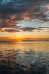Obraz premium Sunset over Manila Bay in Ermita, Manila, The Philippines