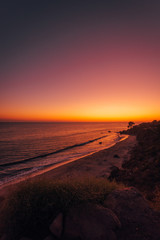 Obraz premium El Pescador State Beach at sunset, in Malibu, California