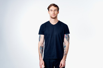 Fototapeta premium portrait of young man with arms crossed