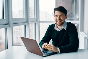 businessman working on laptop in office