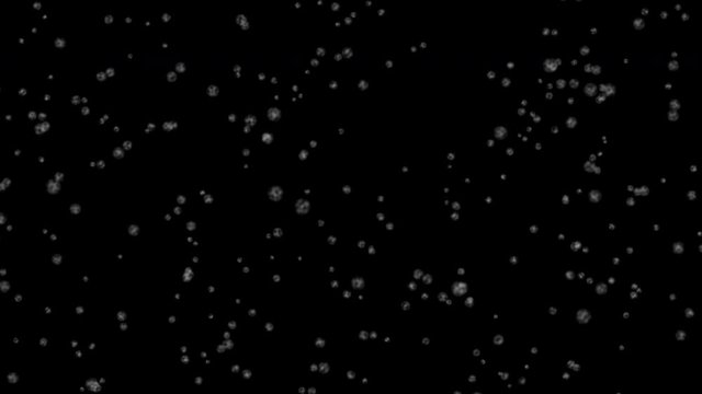 Stock 4k: Winter snow fall glowing on black background. High quality best stock abstract footage of snow, snowstorm falling on dark night. Good design elements, illustration, card, backdrop, creative
