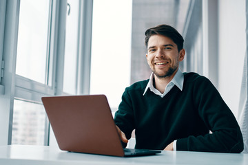businessman working on laptop in office