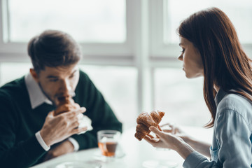 young couple having dinner in restaurant