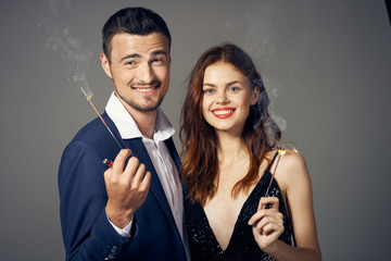 man and woman with thumbs up