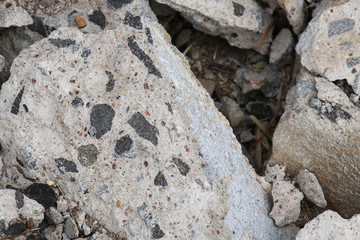 concrete aggregate waste on building site abstract textured background