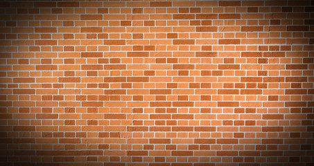 Restored red-orange and brown decorative brick wall. Vignetting around the edges.