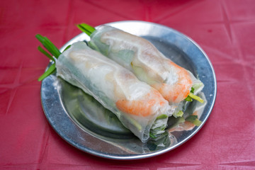 Vietnamese famous local cuisine, fresh shrimp rolls and chives