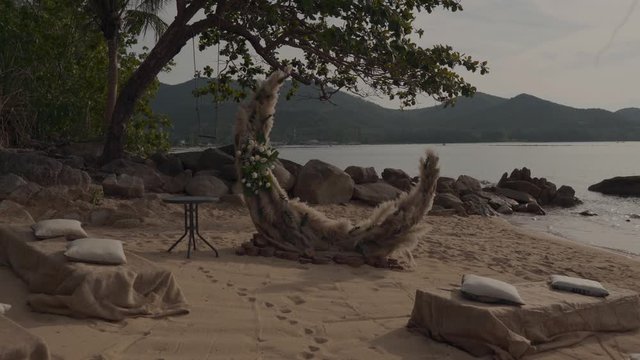 Wedding on tropical beach decoration arch crescent moon shape boho style