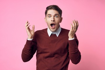 man with hands on his head